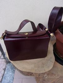 originali borse : Salvatore Ferragamo e Cartier .