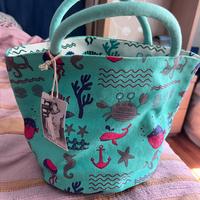 Pochette reversibile con pareo in pendant