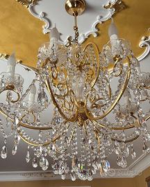 lampadario con applick in swaroski, vetrina oro