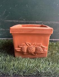 Vaso in terracotta con limoni