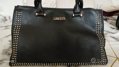 Borsa nero in ecopelle con borchie