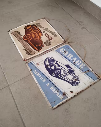 Riproduzione di due targhe auto vintage