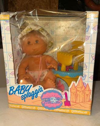 bambola baby spiaggia
