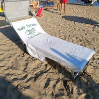 Telo coprilettino da spiaggia.