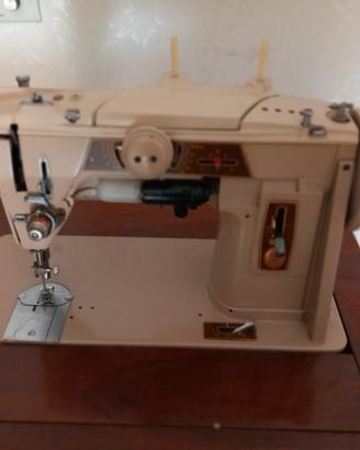 mobile con macchina x cucire singer 