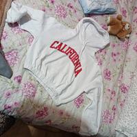 felpa corta  nuovissima tg m con cappuccio 