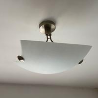 Lampadario in vetro e acciaio