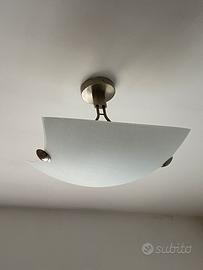 Lampadario in vetro e acciaio