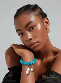 Bracciale occhio di gatto azzurra e perle di acqua