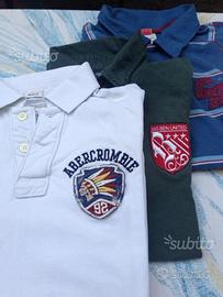 Magliette polo ragazzo stock