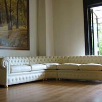 Divano Chesterfield angolare con letto integrato