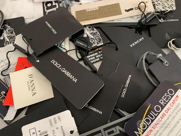 Etichette moda Gucci, D&G, Richmond, Ralph Lauren