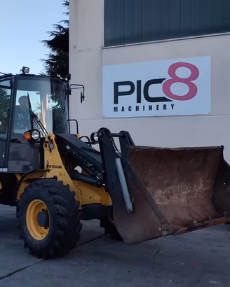 Pala gommata New Holland W80TC