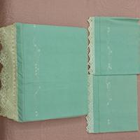 Lenzuola ricamate a mano