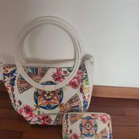 Borsa e portafoglio Alviero Rodriguez