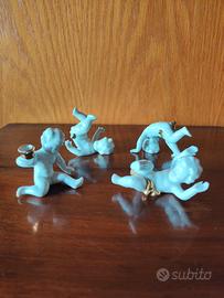 Gruppo di putti in porcellana di Capodimonte 