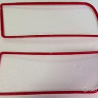 Coppia griglie rosse mascherina lancia delta evo