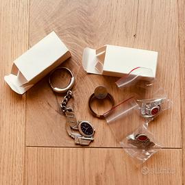 Spille e portachiavi Movado orologi