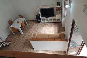 Monolocale arredato con soppalco