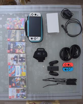 Nintendo Switch OLED + giochi e accessori