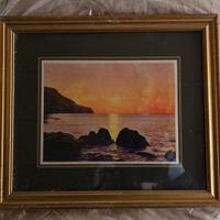 Quadro incorniciato con promontorio e scogli mare