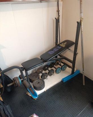 Panca piana con bilanciere manubri più 65kg dipeso