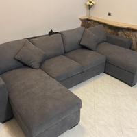 Divano angolare apribile con contenitore.