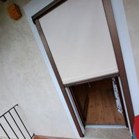 Tenda richiudibile a rullino
