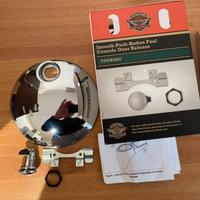 Coperchio serbatoio con apertura a pulsante H-D
