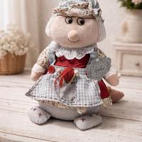 Fermaporta nonna che fa la maglia