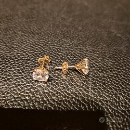 Orecchini punto luce in oro  750/1000