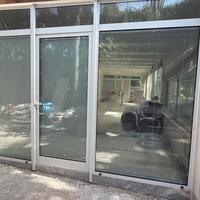 Infisso con porta per veranda
