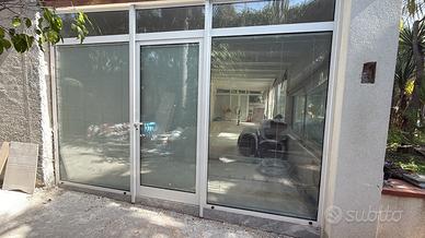 Infisso con porta per veranda