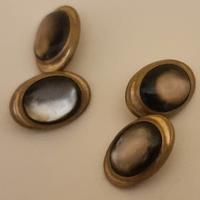 Gemelli d’epoca in ottone dorato con pietre