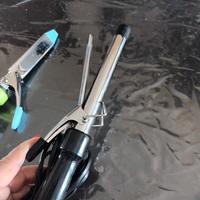 arriccia capelli e piastra triangolare frisee