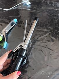 arriccia capelli e piastra triangolare frisee