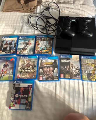 Play station 4 + 2 joystick+ set giochi