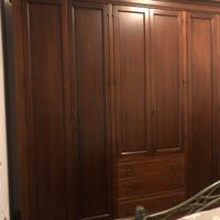 Camera da letto in noce massello