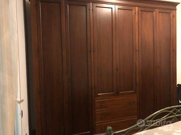 Camera da letto in noce massello