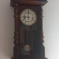 orologio a pendolo in legno vintage