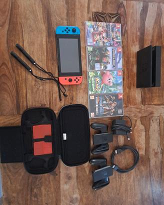nintendo switch + 4 giochi+ custodia 