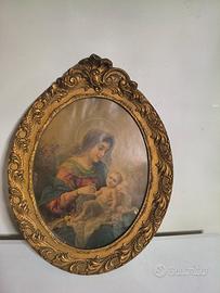 Quadro con cornice in legno dorata 