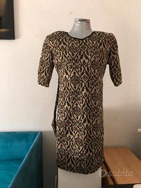 Abito sartoriale nero ed oro