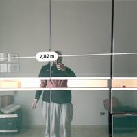 Armadio a specchio nero lucido