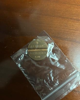 Gettone telefonico 7701