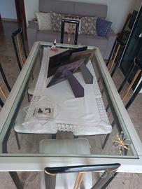 tavolo con piano in cristallo  e sei sedie