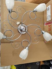 Lampadario vetro e acciaio