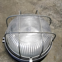 Lampada da parete per esterno rotonda