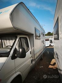camper mansardato