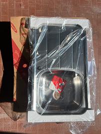 Lavabo con gocciolatoio